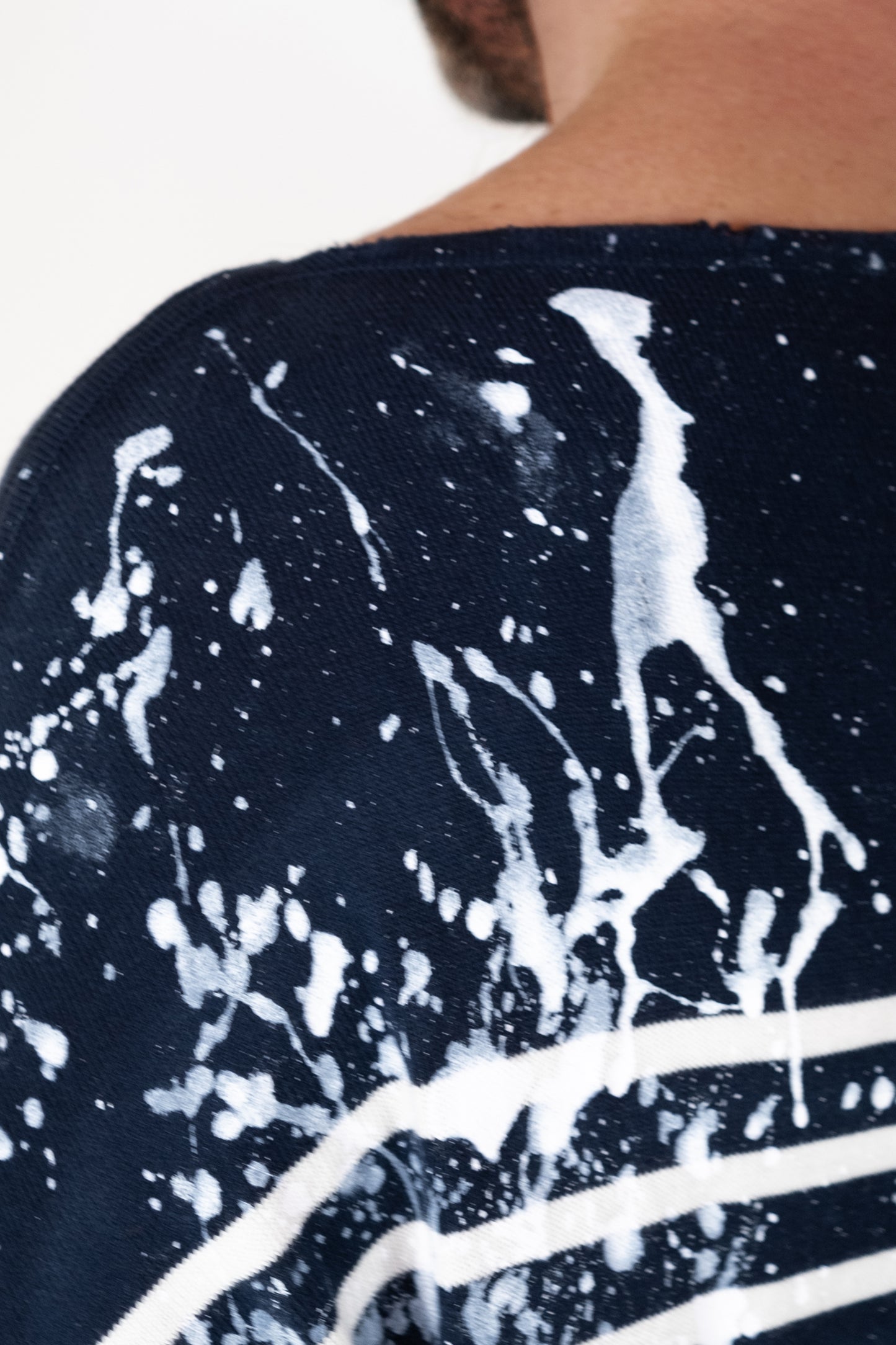 Stylish men's shirt in tie-dye cotton, featuring bold navy and white stripes for a fashion-forward twist