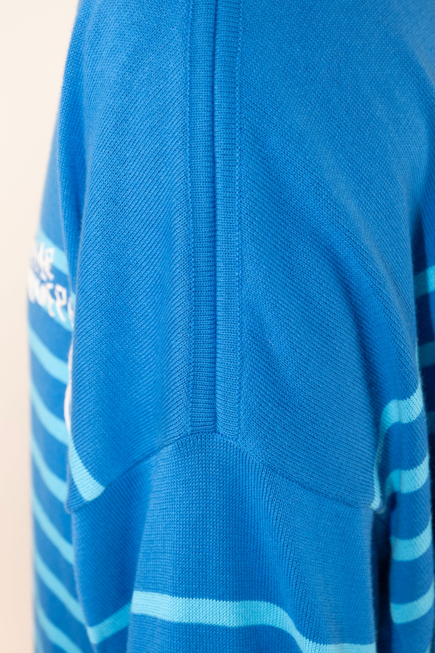Close-Up of Women's Striped Breton Shirt - blue with blue stripes