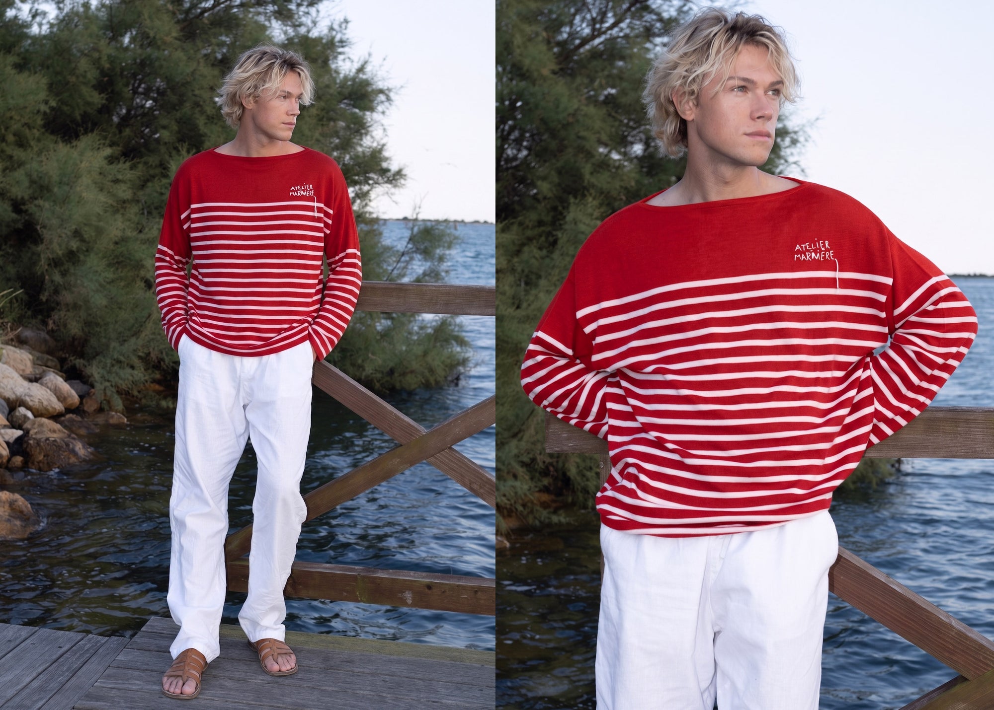 Model wearing Atelier Marinière's signature oversized red Breton shirt on a waterfront promenade in the Venetian lagoon.